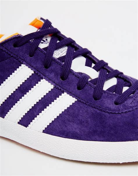 purple adidas sneakers|purple adidas originals.